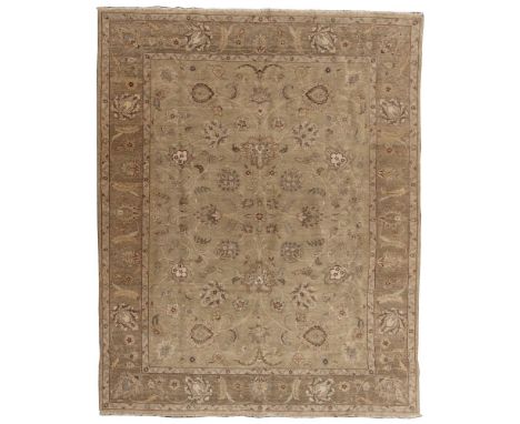 Room Size Wool Rug  Having an abstract floral and feather pattern in hues of gray and taupe on a cream field; having short fr