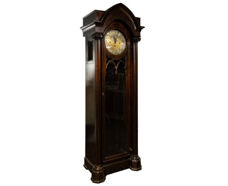 Gothic Revival Tall Case Clock  Chiming pendulum clock having brass bob, wood case, velvet lined, open work, locking access d