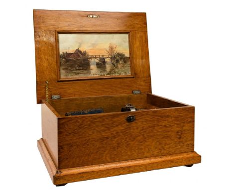 Capital Cuff Music Box  In a locking wood case, hand crank operation, countryside print on inside of lid and (7) music cylind