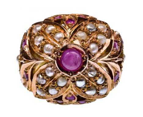 14k Yellow Gold, Seed Pearls and Ruby Ring  Having a round cut ruby flanked by seed pearls and round cut rubies; marked '14k'