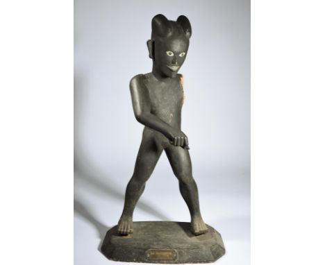A Nicobar scare devil figure, Bay of Bengal modelled as an Andaman figure with a wide parted coiffure and an open mouth with 