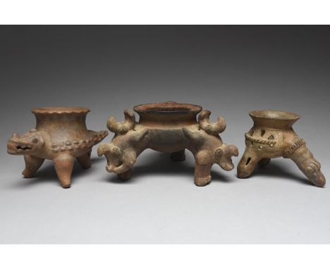 An Atlantic Watershed tripod bowl Costa Rica, circa 100 BC - 500 AD terracotta, modelled with double headed zoomorphic suppor