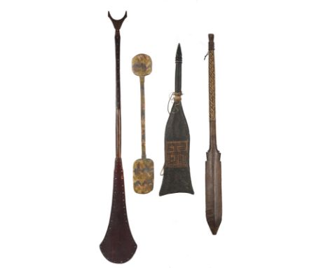 A Kayapo club Brazil with a pointed blade and a woven fibre bound handle with a knopped terminal, 78.2cm long, a Wayana club,