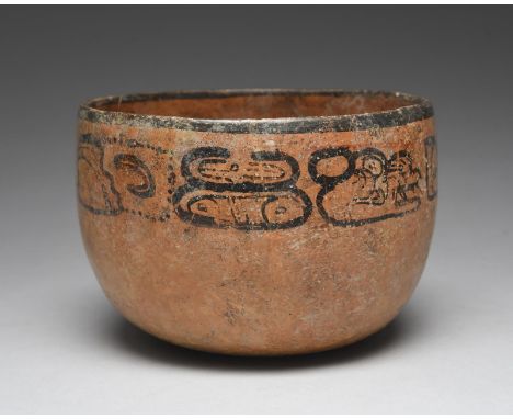 A Maya bowl Guatemala, circa 250 - 750 AD terracotta, with a light orange ground and a painted black band of glyphs and rim, 