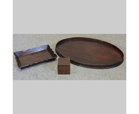 A Georgian mahogany tray, 60cm, together with another smaller and a Georgian tea caddy