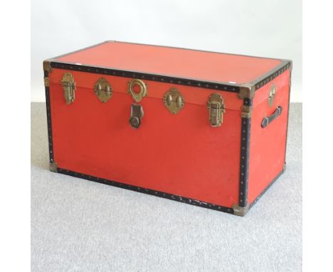 A 20th century red travel trunk, 92cm