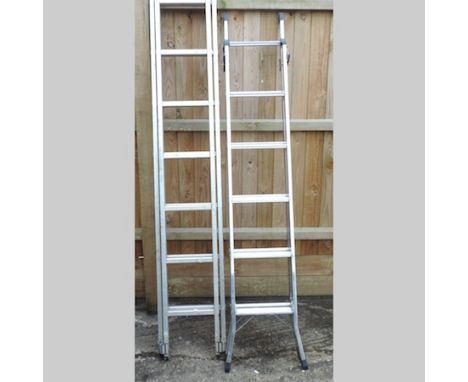 An aluminium ladder, together with another