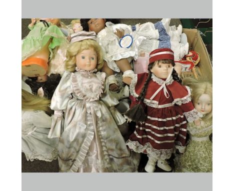 A collection of approximately twenty seven bisque headed collector's dolls