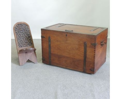 A hardwood metal bound trunk, 97cm, together with an African carved hardwood chair