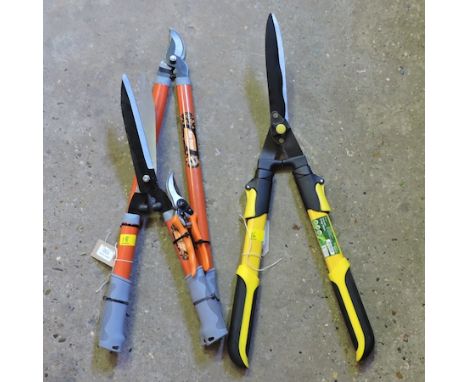 A pair of telescopic hedging shears, together with a lopper, shear and secateur set