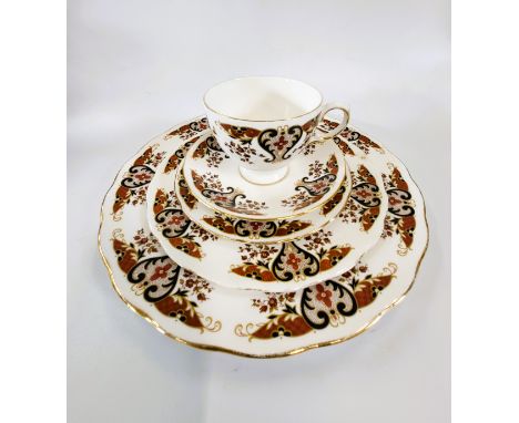 A Colclough porcelain dinner tea and coffee service (lacks pots) (121), and a pair of old Country Roses Calendar plates. (123