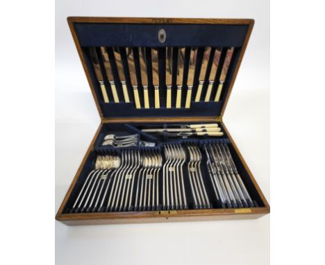 Mappin &amp; Webb canteen of stainless steel cutlery including six table knives and forks, six fish eaters knives and forks, 