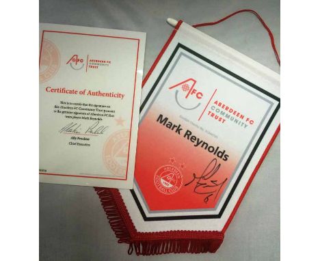 ABERDEEN FOOTBALL CLUB MARK REYNOLDS SIGNED PENNANT 

Generously donated by Aberdeen FC Community Trust

2015/6 season Mark R