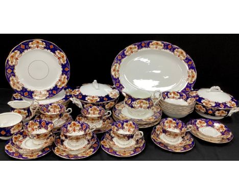 A Royal Albert ‘Heirloom’ pattern table service for six including; six tea cups and saucers, side plates,  six dinner plates,