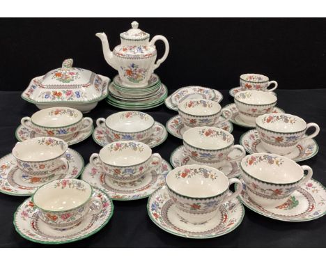 A part Spode ‘Chinese Rose’ tea service for six including; six tea cups and saucers, a tea pot, four side plates; etc 