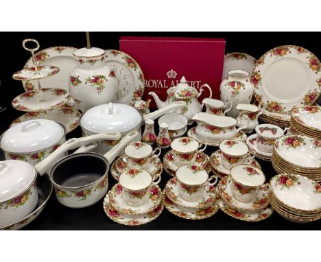 A extensive Royal Albert ‘Old Countryroses’ table service for six comprised of; six dinner plates, six smaller, six bowls, ei