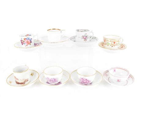 A selection of eight 19th century Masons cups and saucers, to include two early 19th century bat printed examples depicting c