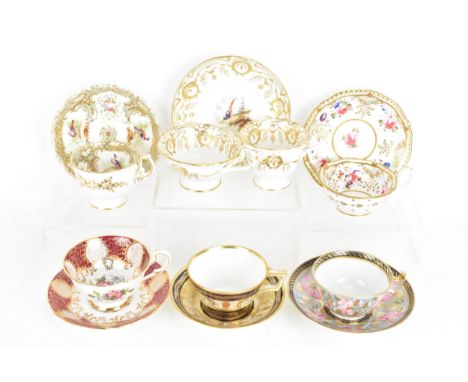 A selection of mainly 19th century cups and saucers to include an early 19th century Derby cup and saucer in cobalt blue with