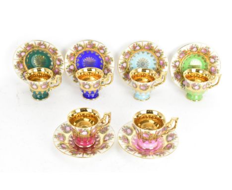 A set of six J K W Decor Carlsbad Alt Wien for Vienna cabinet cups and saucers, each transfer-printed with vignettes depictin