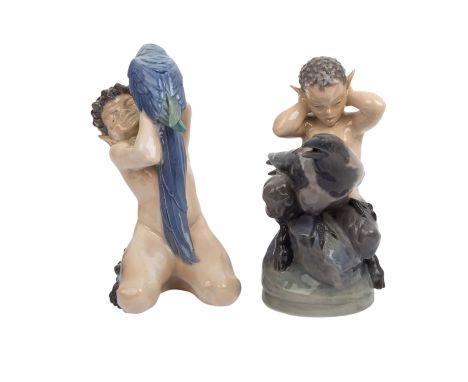ROYAL COPENHAGEN 2 Faune, 1. Wahl, Marke von 1956. 1 Faun mit Papagei, Modell-Nr. 752, H. ca. 18cm, Flügelspitzen restauriert