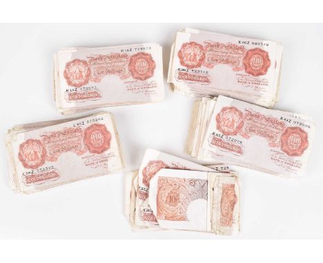 Four hundred and one Bank of England, Ten Shillings banknotes, Series "A" Britannia Issue, March 1950, Red-Brown, P.S. Beale,