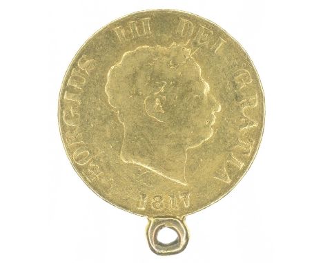 King George III, Half-Sovereign, 1817, Laureate head r. date below R. Crowned shield, the milled edge having been partially s