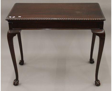 An early 20th century mahogany card table. 91 cm wide.