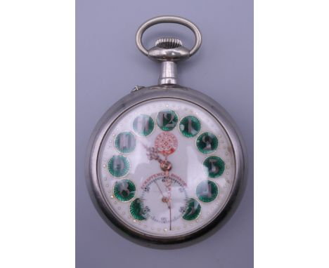 A Continental silver plated pocket watch with enamel decorated dial. 6.5 cm wide. 