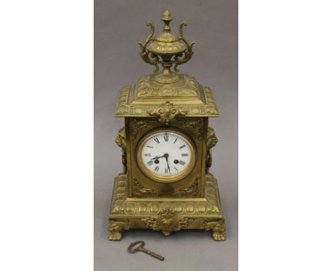 A Victorian brass mantle clock, the movement stamped MAPLE &amp; CO PARIS and further stamped JAPY FRERES &amp; CO. 42.5 cm h