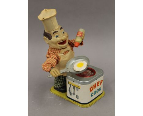 A mid-20th century Japanese Chef Cook battery operated automaton toy. 25 cm high.