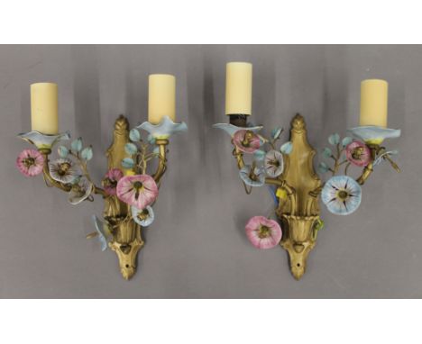 A pair of vintage ceramic and glass mounted brass wall lights. Each approximately 30 cm high.