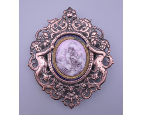 A 19th century copper and enamel plaque in a 19th century frame.  10.5 cm high.