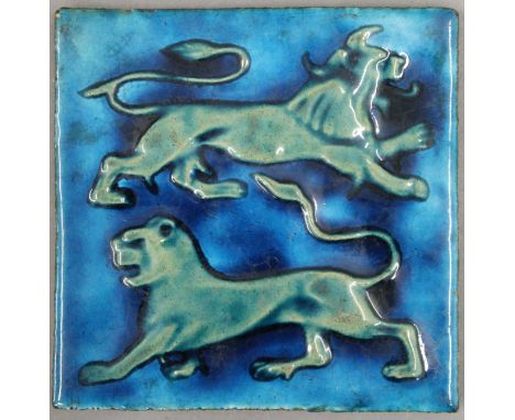 WILLIAM DE MORGAN pottery tile, decorated with two lions. 15.5 x 15.5 cm.