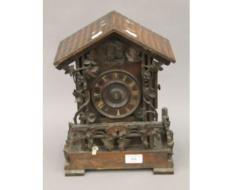 A Blackforest cuckoo clock. 34 cm high.