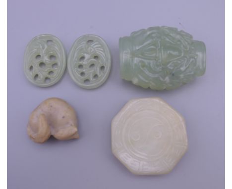 A small collection of various carved jade items, etc. The largest 4 cm high.