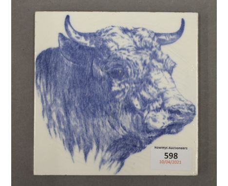 A Minton butcher's shop tile decorated with a bull. 15.25 cm wide.