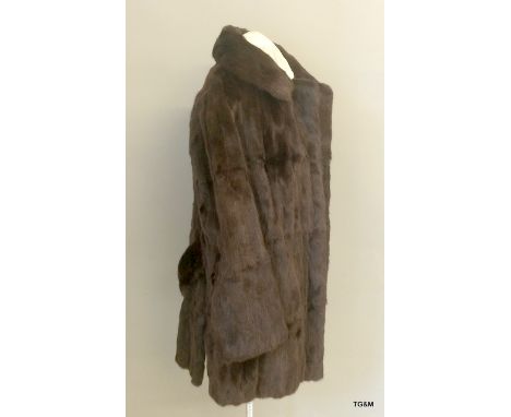 A 3/4 length genuine vintage mink coat.
