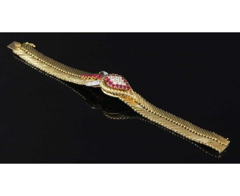 An 18ct gold ruby and diamond set Jaeger-LeCoultre mechanical back wind cocktail watch, c.1950, for Kutchinsky. A circular si