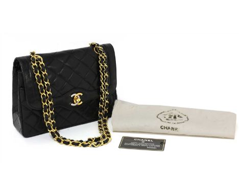 A Chanel matelassé lambskin leather shoulder bag, a lambskin leather body, exterior back slip pocket, gold tone chain with in