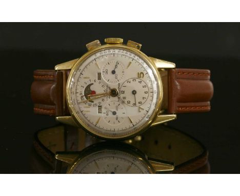 A gentlemen's 14ct gold, Universal Geneve tri-complex triple date moon phase mechanical Chronograph strap watch, with a circu