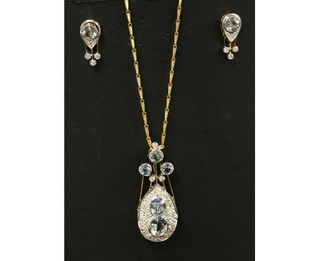 An 18ct gold aquamarine and diamond pendant/brooch and earring suite, c.1980, the pendant with a pear-shaped plaque, rub set 