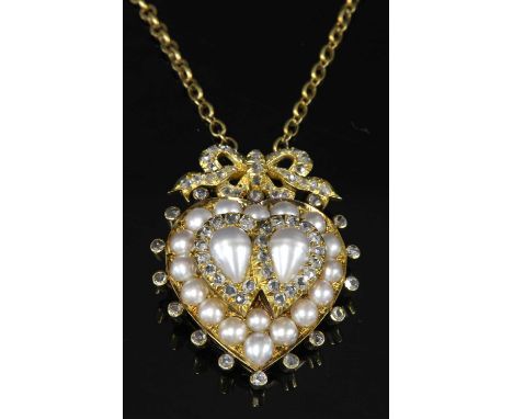 A Victorian gold, split pearl and diamond entwined hearts pendant, c.1870, with two pear-shaped split pearls, surrounded by r