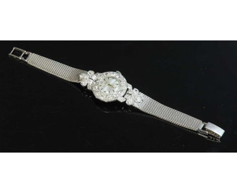A ladies' platinum Marvin mechanical cocktail watch, with a later 9ct white gold diamond set bracelet. The circular case, 25m