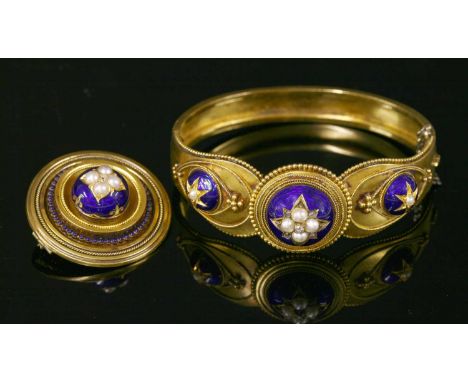 A cased Victorian gold split pearl, diamond and enamel bangle, c.1860, together with a matched shield form brooch. The bangle