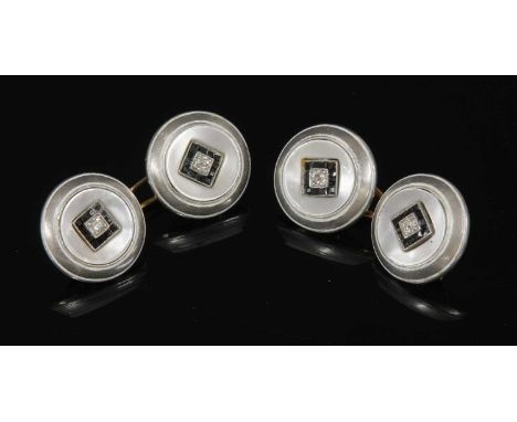 A pair of Continental Art Deco gold, platinum, diamond, mother-of-pearl and enamel cufflinks, each circular plaque with an ol