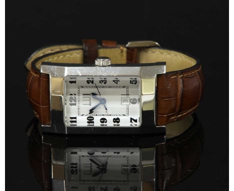 A ladies' stainless steel Dunhill Facet quartz strap watch, TXQH, c.2002. Case 38 x 21mm. A white enamelled dial with black A