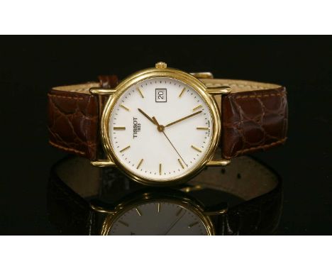 A gentlemen's 18ct gold Tissot 1853 quartz strap watch, c.2004, a circular 33mm case, with a white dial, gilt hands and baton