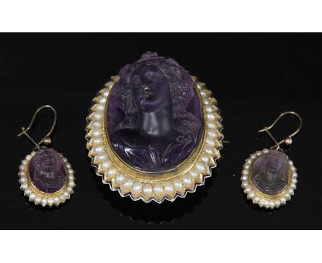 A Victorian gold carved amethyst cameo and split pearl brooch, the brooch with a carved amethyst female bust, rub set to a bl