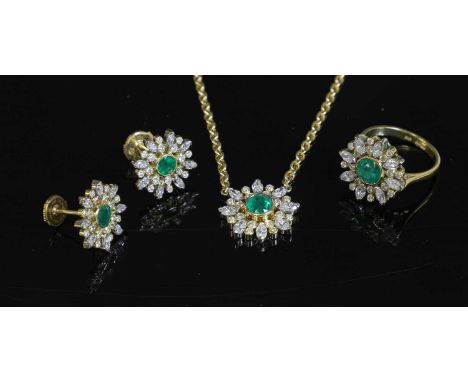An 18ct gold emerald and diamond cluster pendant necklace, earring and ring matched suite, with a round mixed cut emerald rub