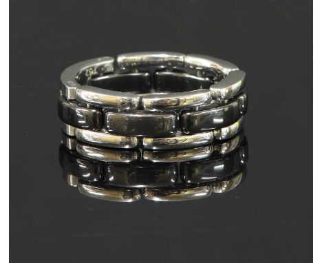 An 18ct white gold and black ceramic Chanel J12 Ultra ring, with a central row of black ceramic panther links to 18ct white g